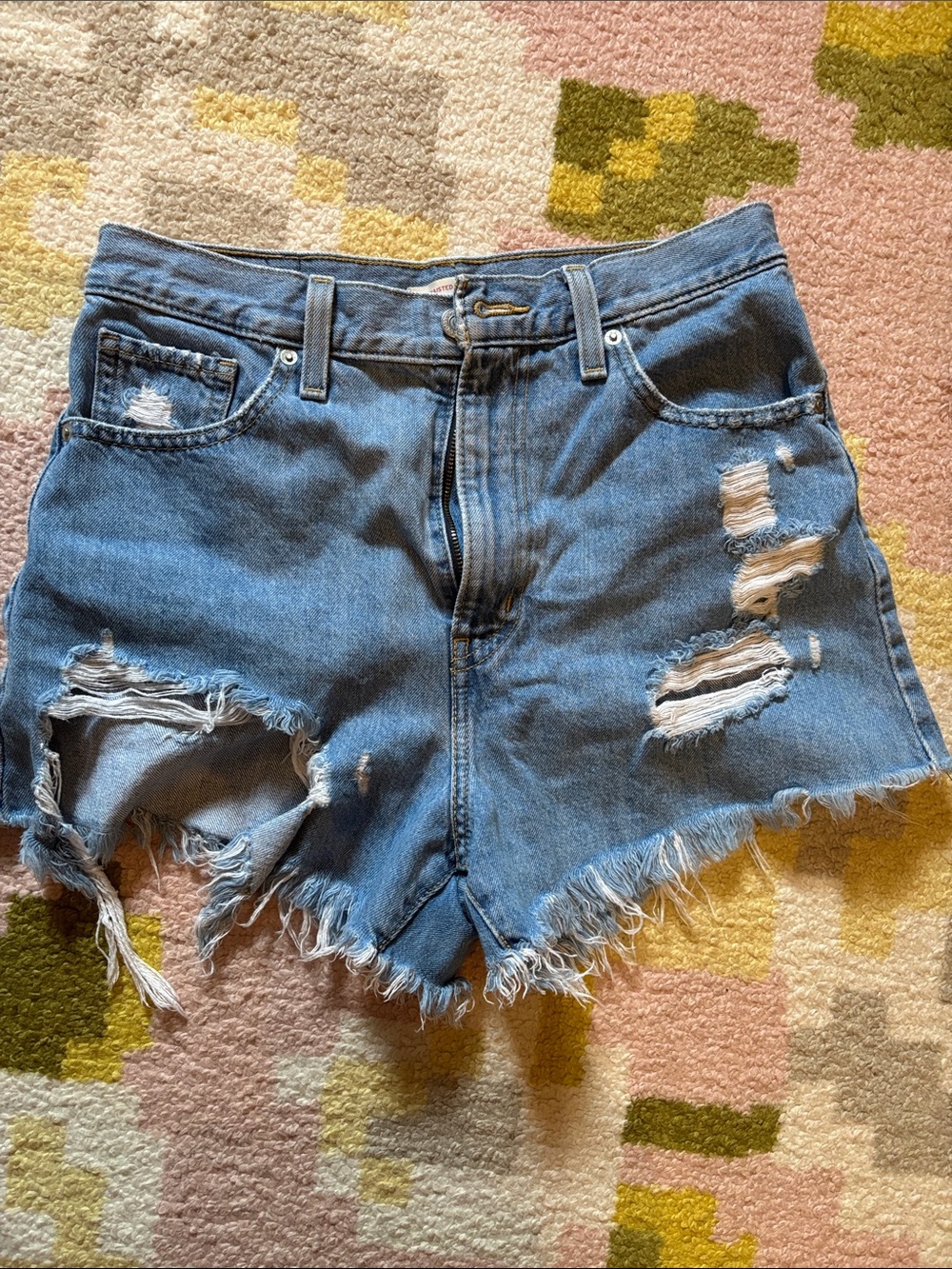 Levi's Light Blue Ripped High-Rise mom denim shorts